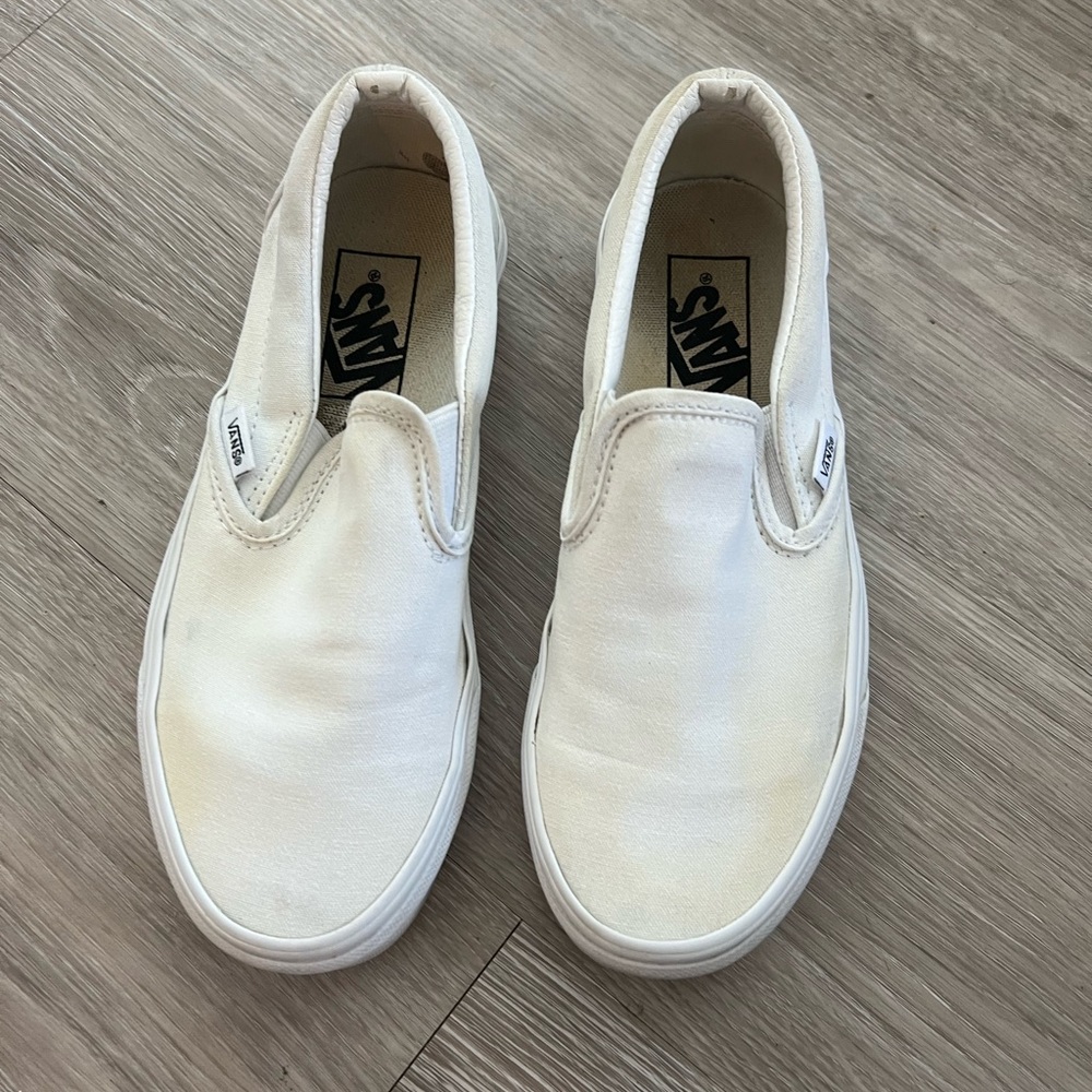 Vans white slip ons